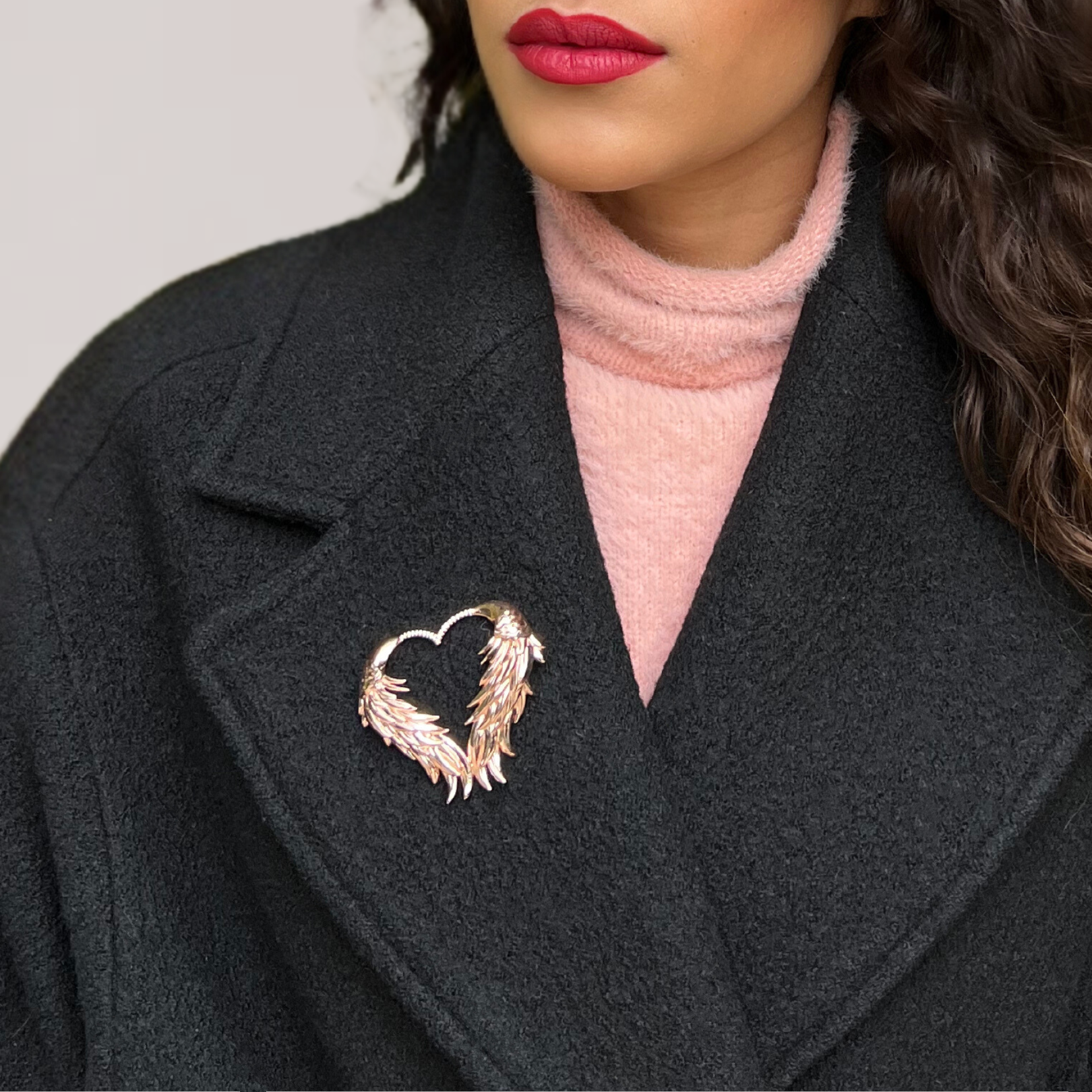 Model wearing 18k rose gold 925 sterling silver heart wings luckenbooth brooch