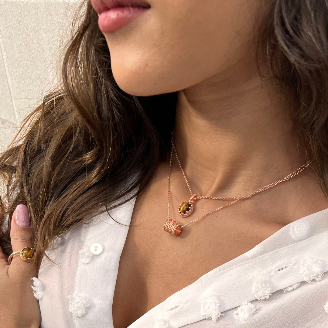 Model wearing 18k rose gold 925 sterling silver tiger eye necklace