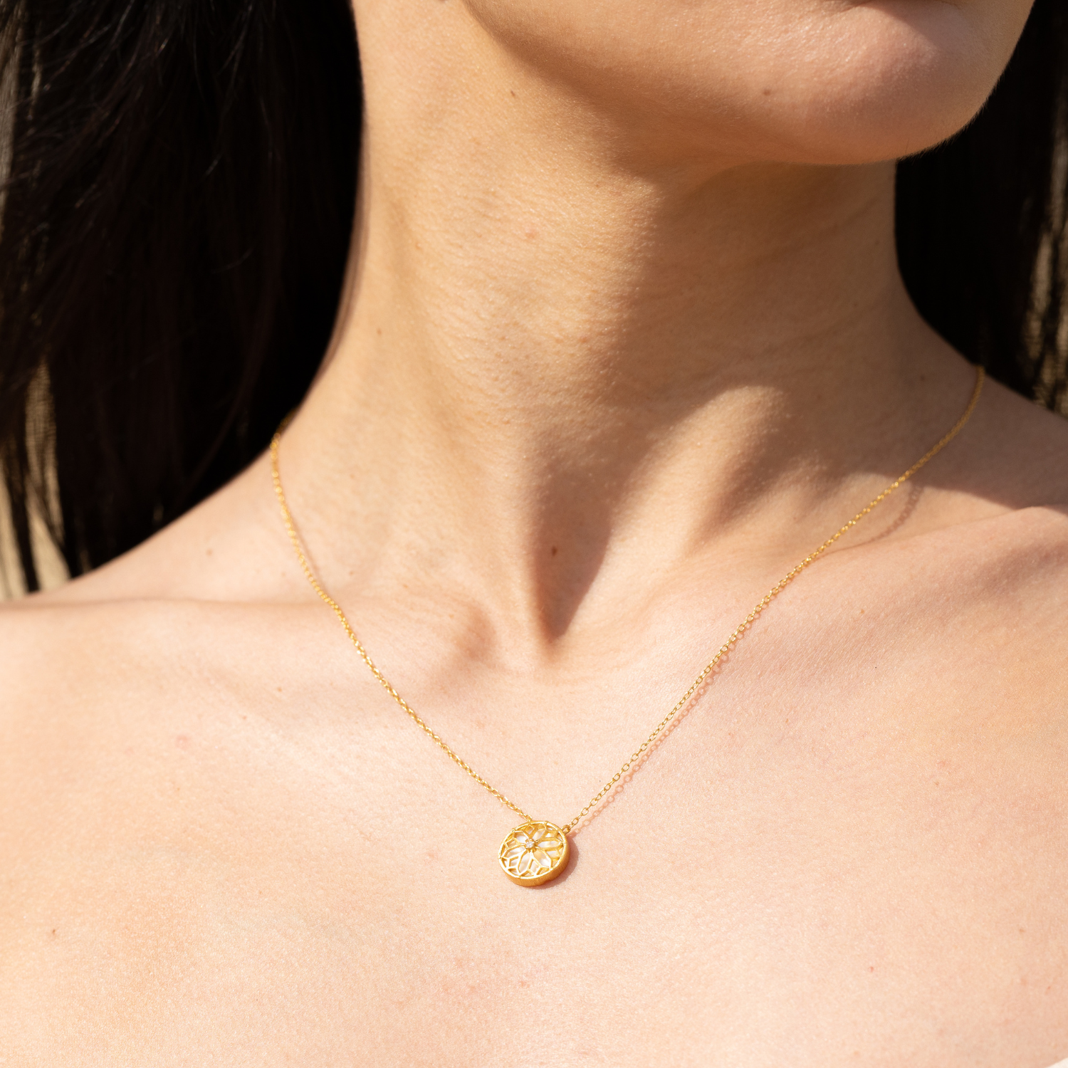 model wearing 18k gold plated sterling silver mother of pearl wolsey necklace