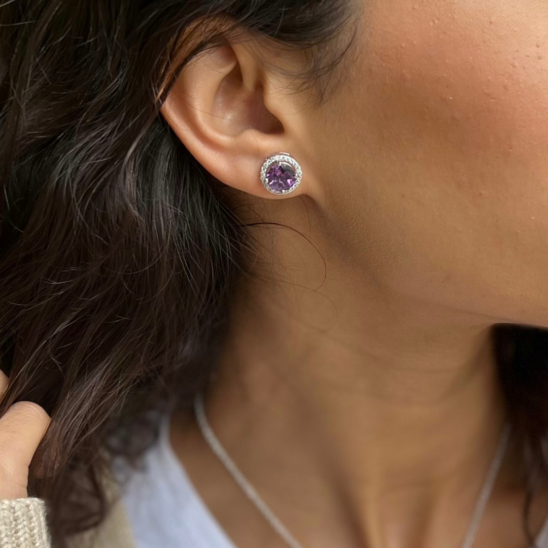 model wearing 925 sterling silver amethyst stud earrings