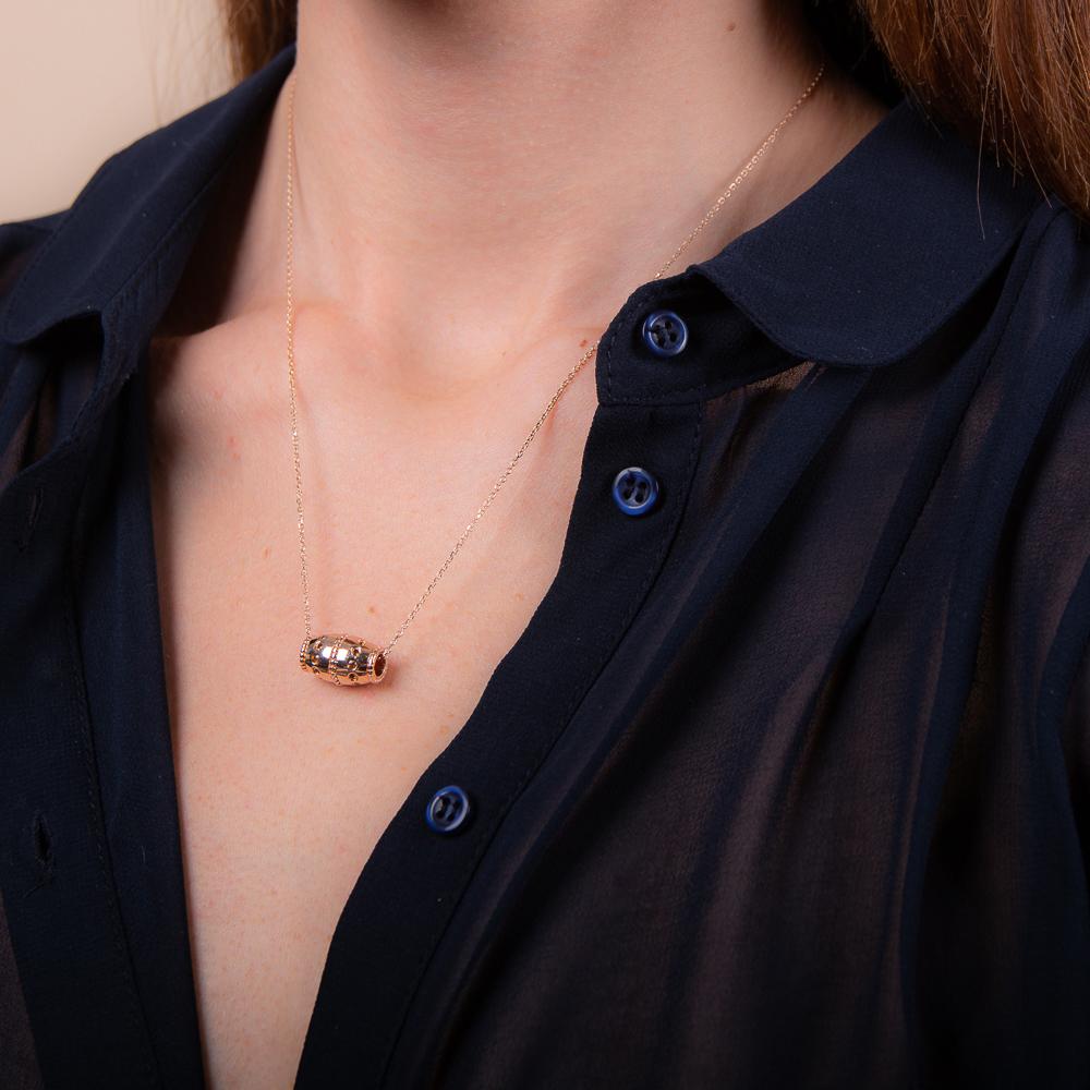 Model wearing 18k rose gold citrine barrel necklace