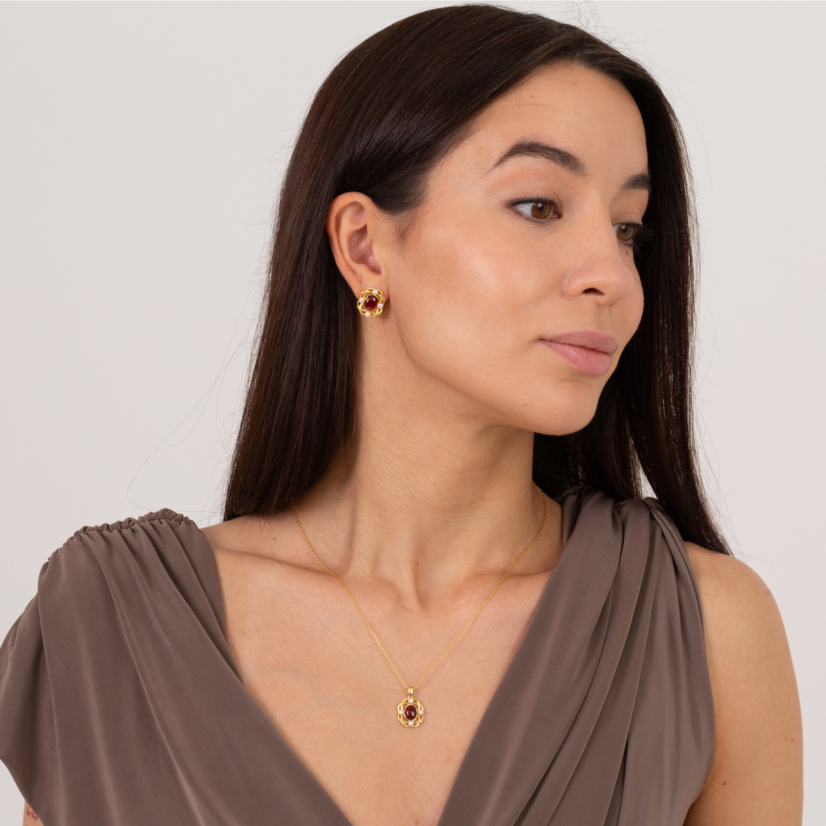model wearing 18k gold plating sterling silver garnet pearl oval earrings