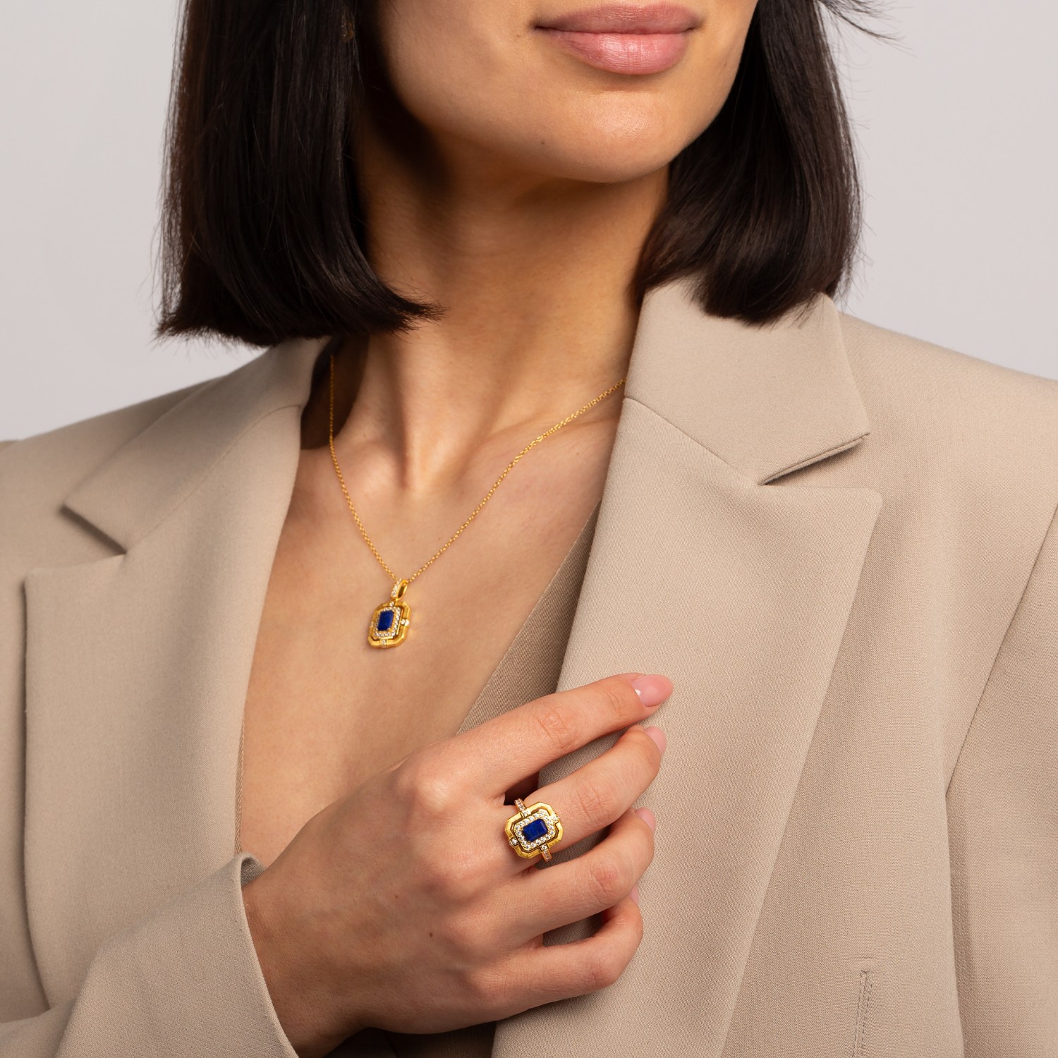 Model wearing 18k gold plated 925 sterling silver lapis lazuli ring, inspired by Greek goddess Hera