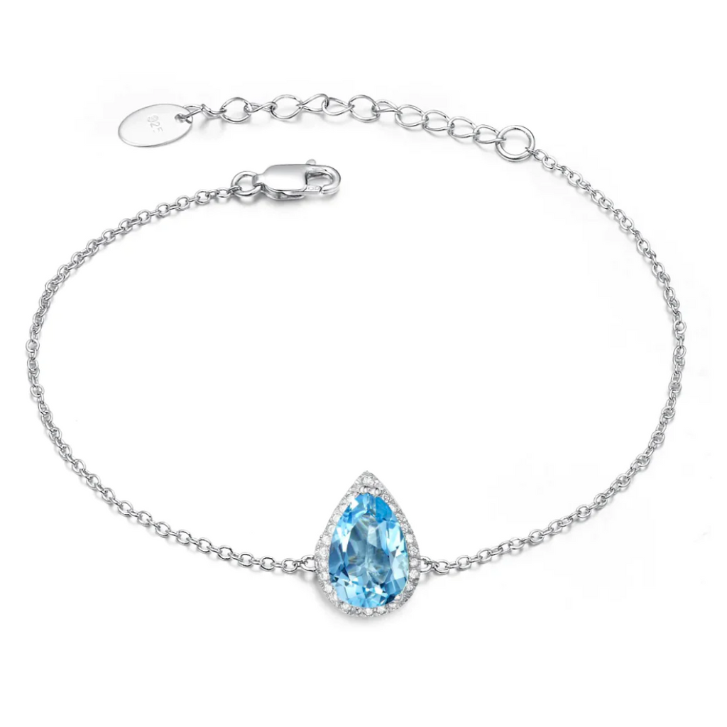 Silver bracelet with blue 2025 topaz