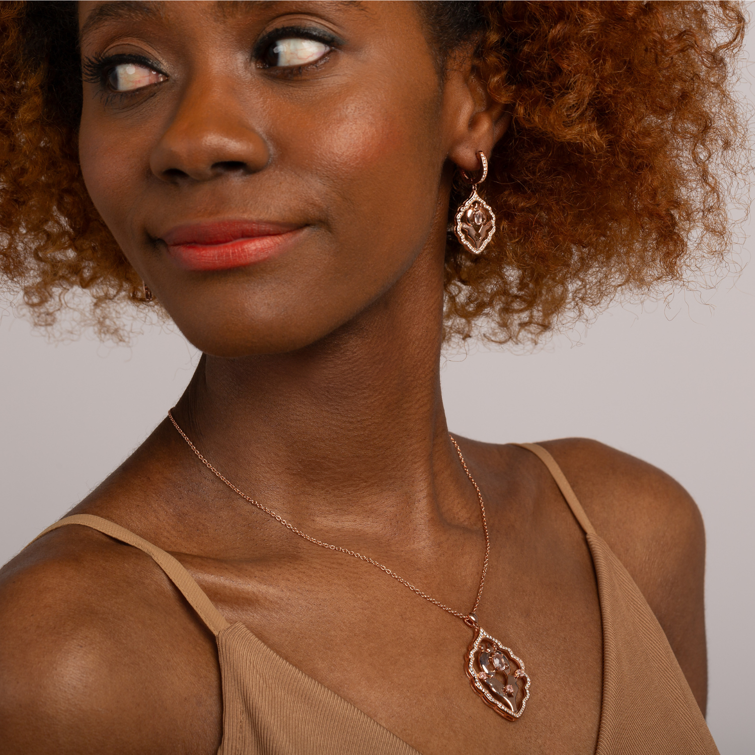 Model wearing 18k rose gold rose quartz Iznik necklace 