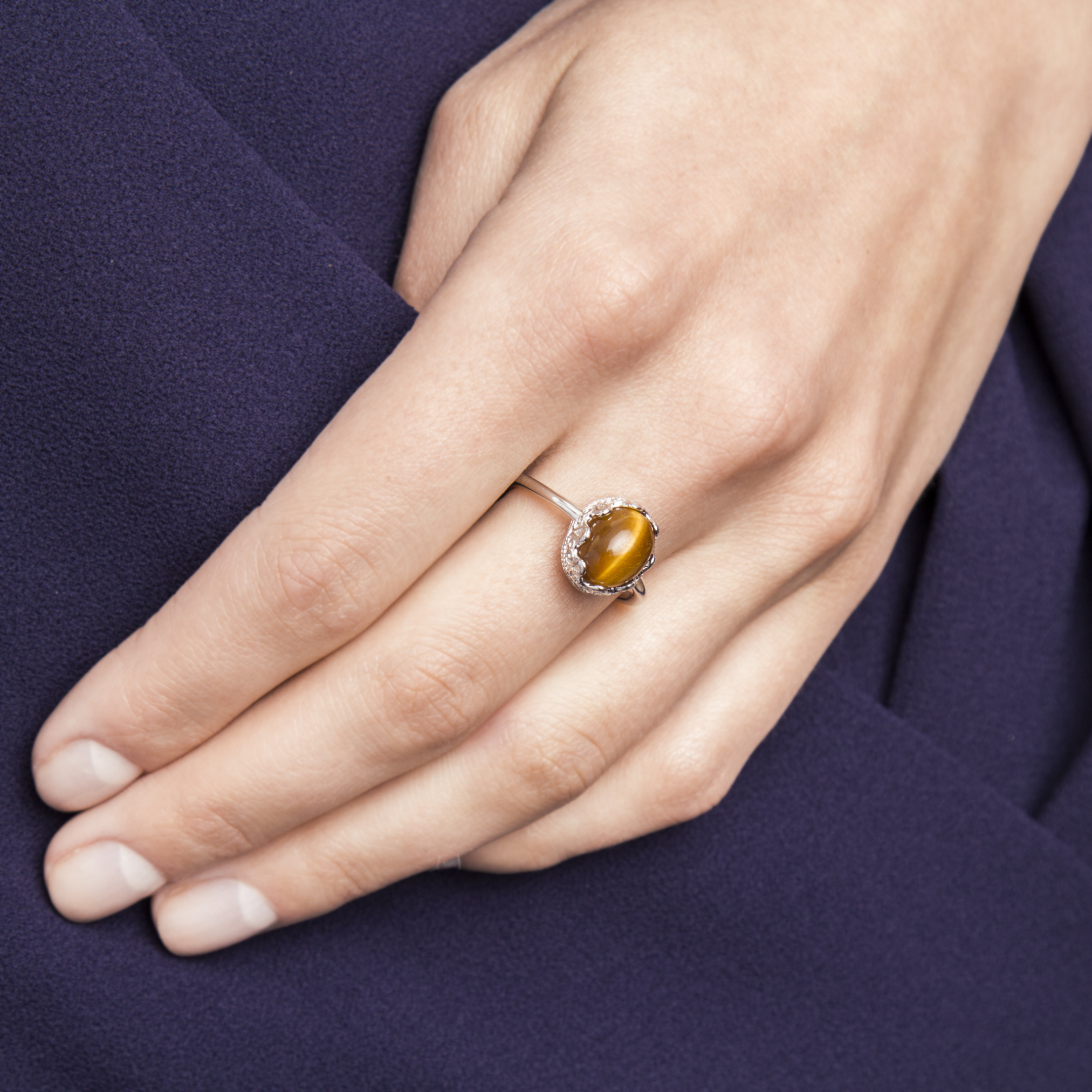 Model wearing 925 sterling silver tiger eye ring 