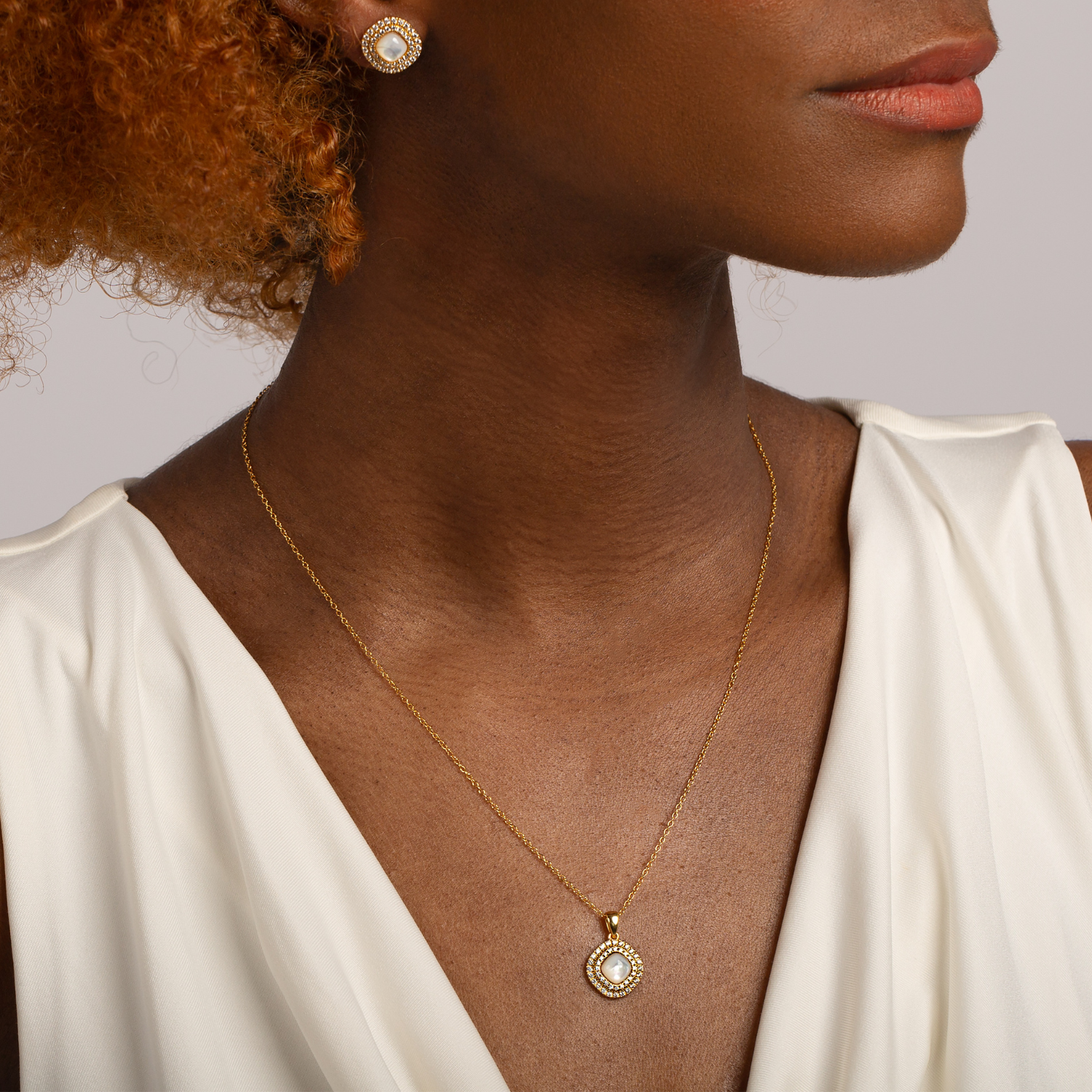 model wearing 18k gold 925 sterling silver mother of pearl necklace