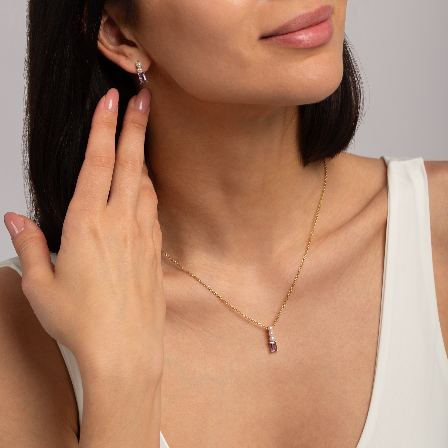 model wearing 18k gold 925 sterling silver amethyst pearl necklace