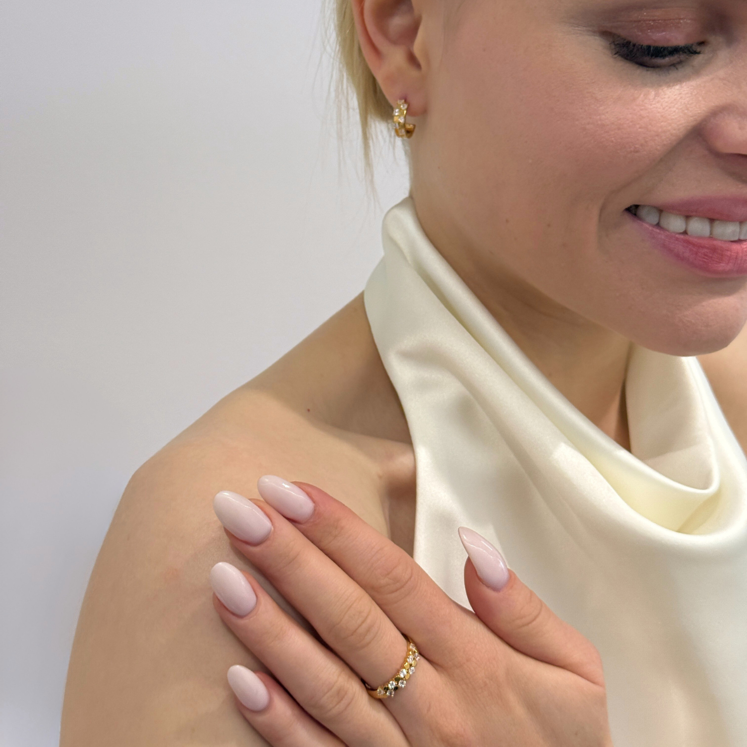 model wearing 18k gold 925 sterling silver cubic zirconia ring