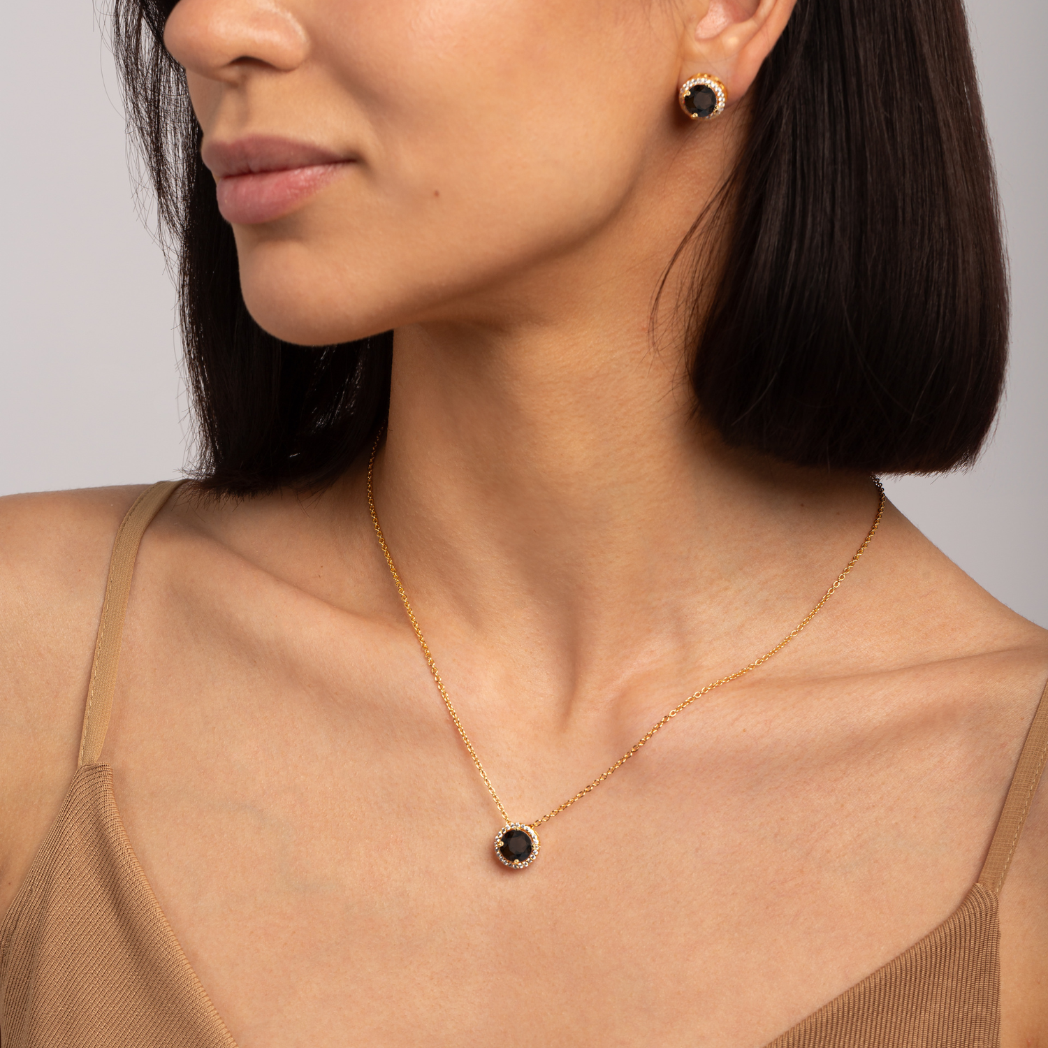 model wearing 18k gold 925 sterling silver smoky quartz gemstone necklace