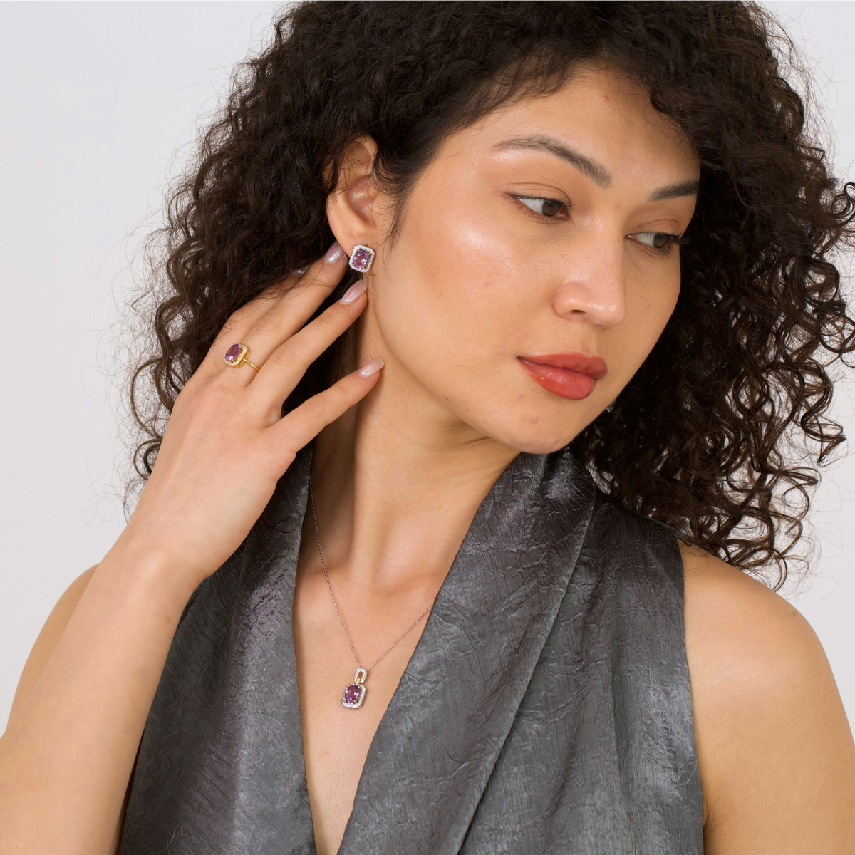 model wearing 18k gold plated sterling silver amethyst aphrodite jewellery set