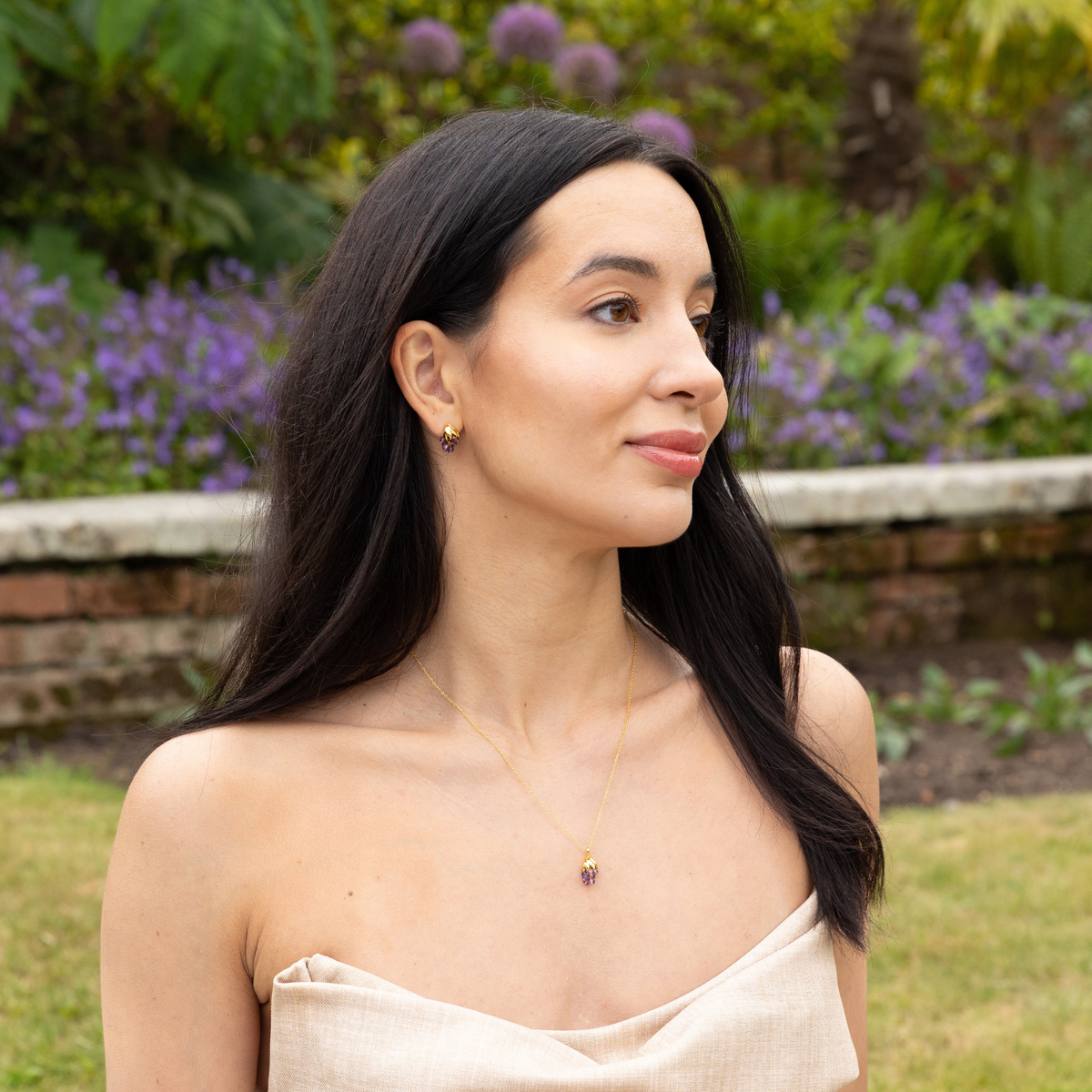 model wearing 18k gold plated sterling silver amethyst wisteria jewellery set