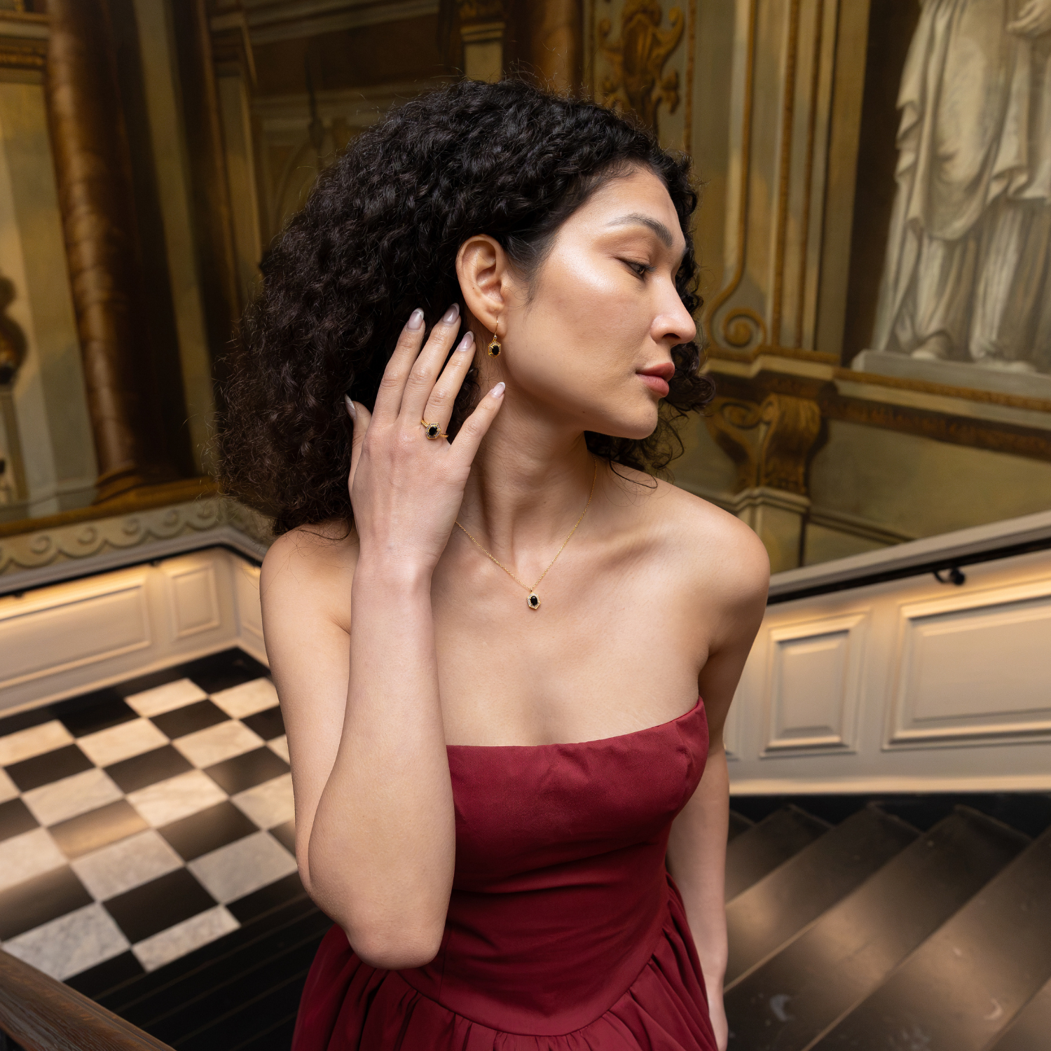 model wearing 18k gold plated sterling silver black agate jewellery set
