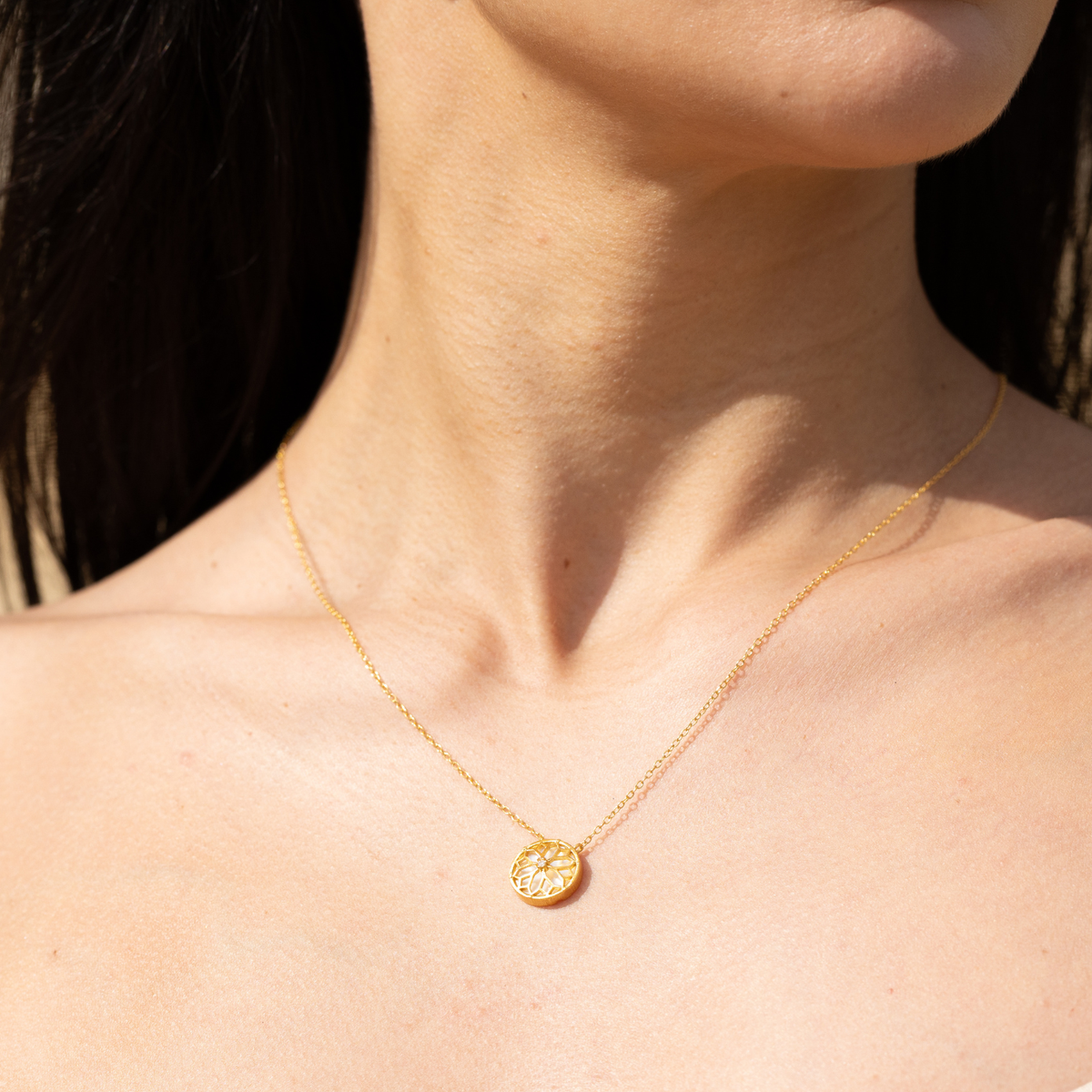 model wearing 18k gold plated sterling silver mother of pearl wolsey necklace
