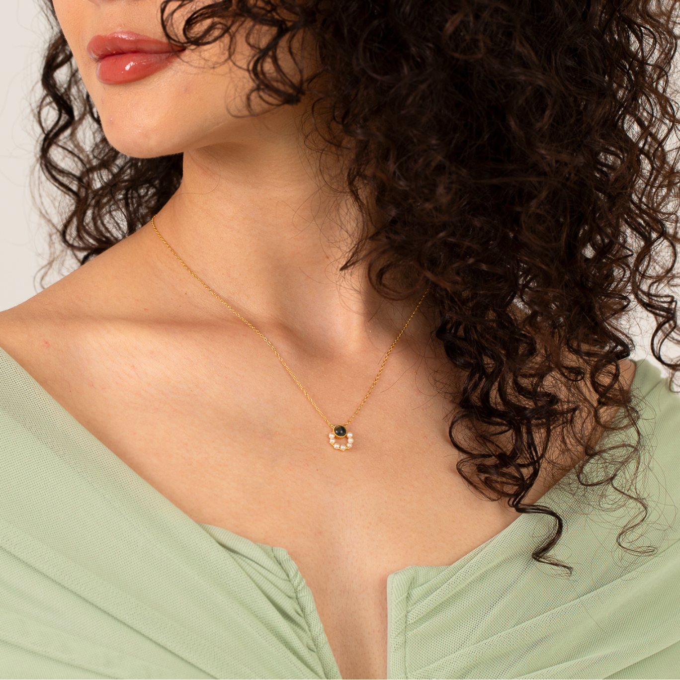 model wearing 18k gold plated sterling silver pearl moss agate necklace