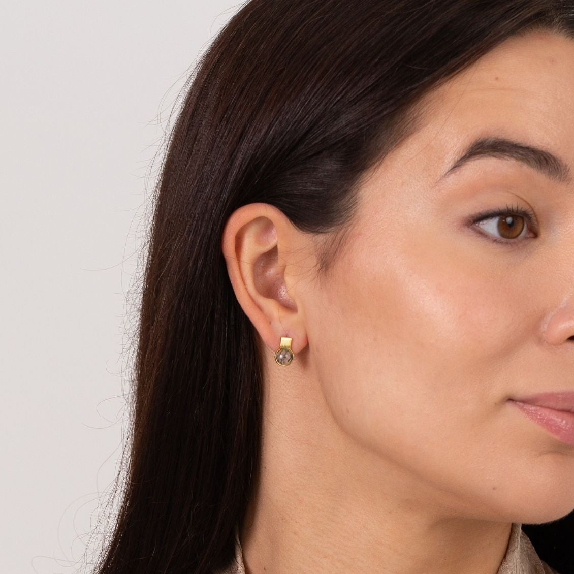 model wearing 18k gold plated sterling silver square moss agate earrings