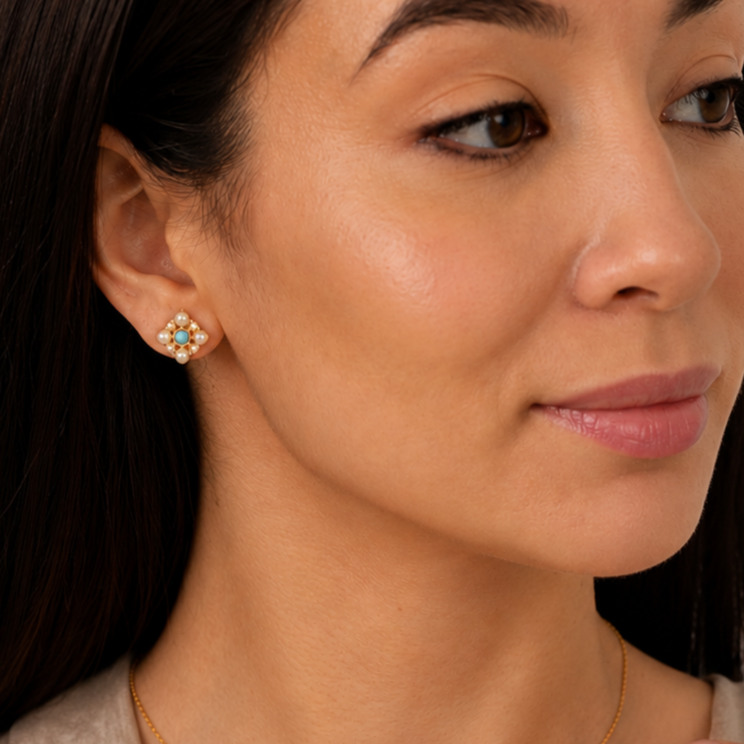 model wearing 18k gold plated sterling silver turquoise pearl earrings
