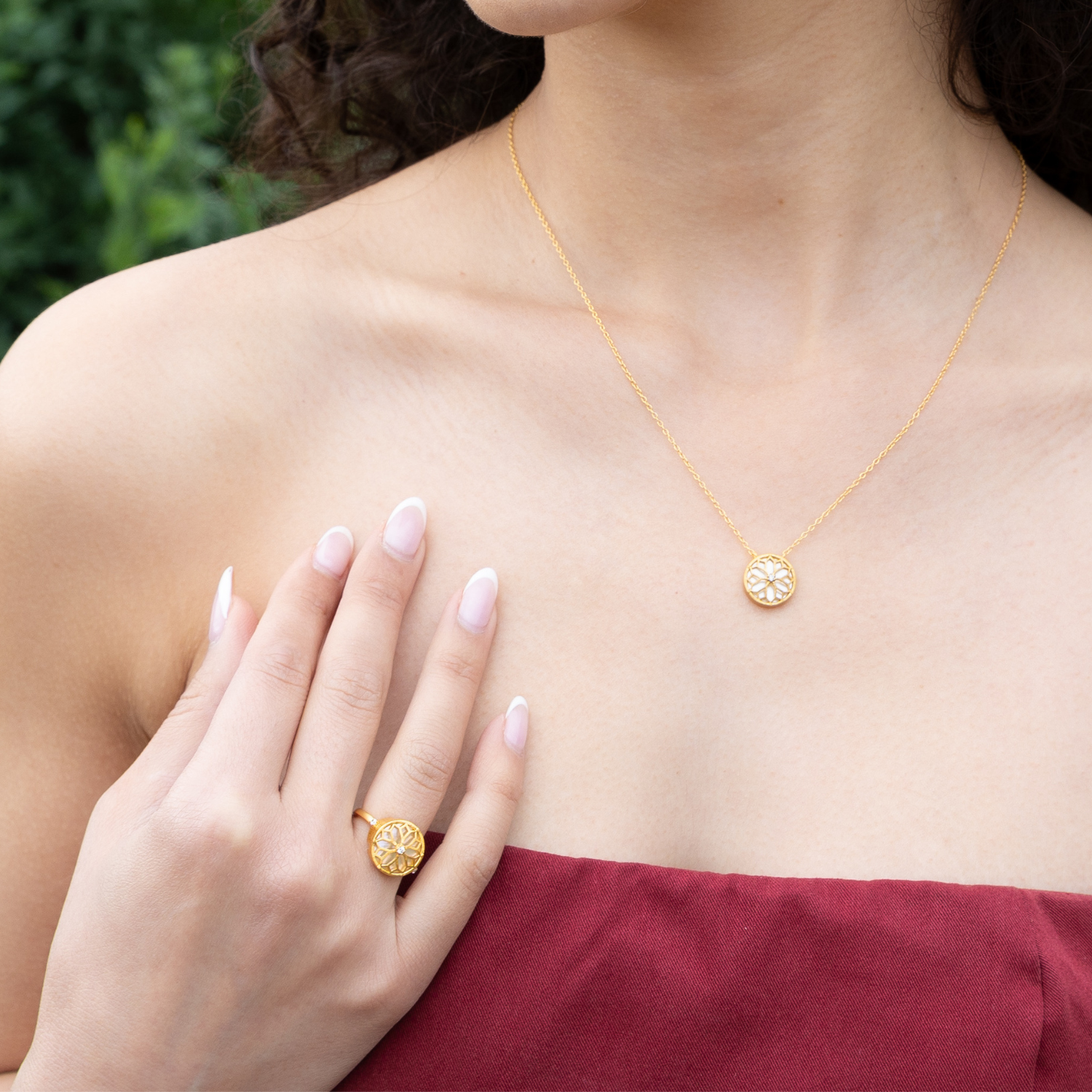model wearing 18k gold plated sterling silver mother of pearl jewellery set