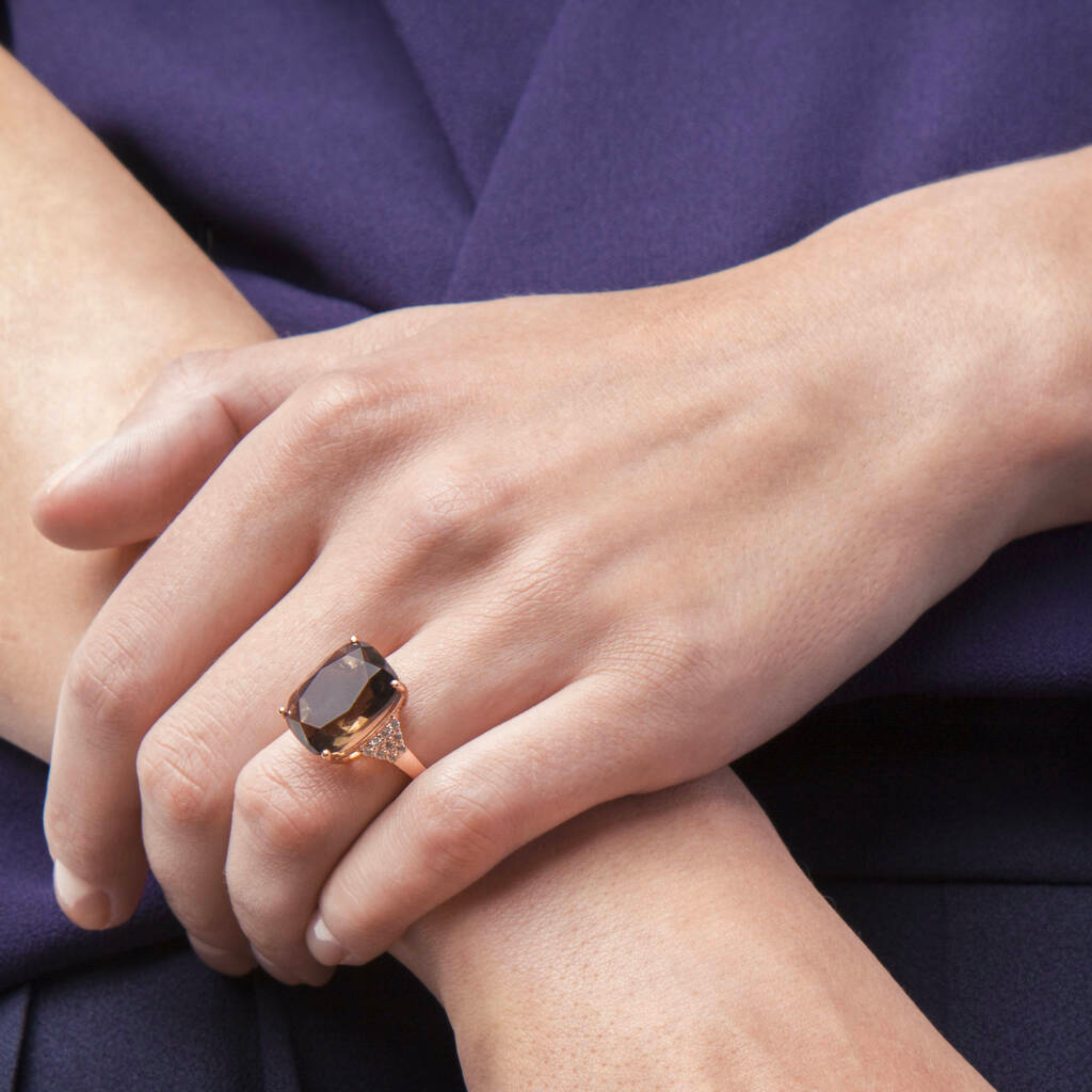 model wearing 18k rose gold 925 sterling silver smoky quartz ring