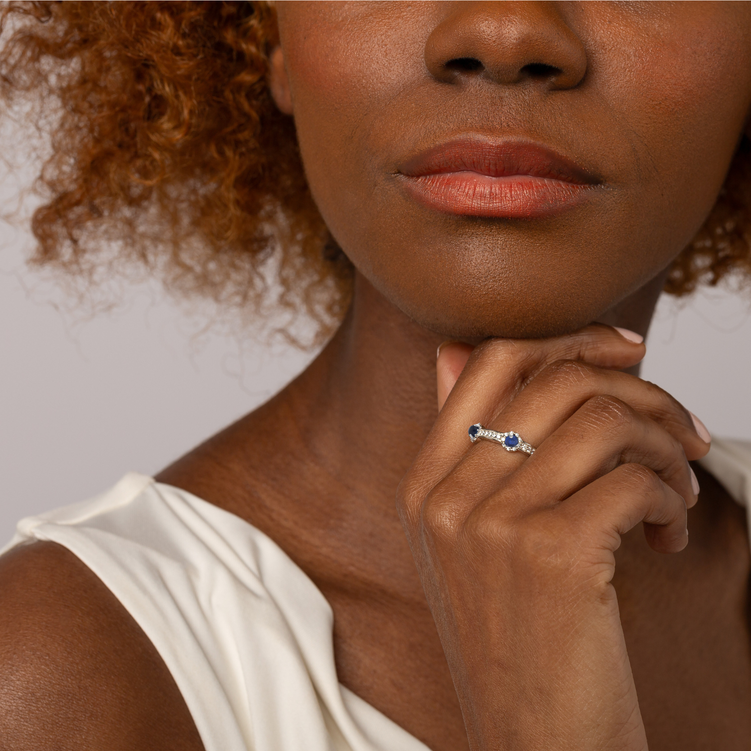 model wearing 925 sterling silver sapphire stacking stone ring