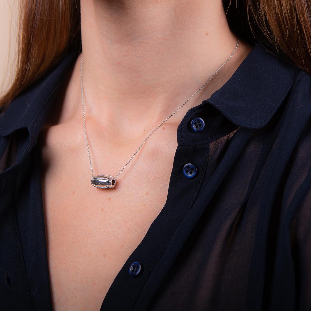 rhodium plated sterling silver Silver blue topaz barrel pendant