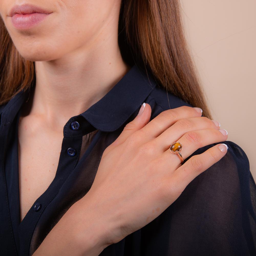 Model wearing 18k rose gold plated 925 sterlign silver tiger eye ring
