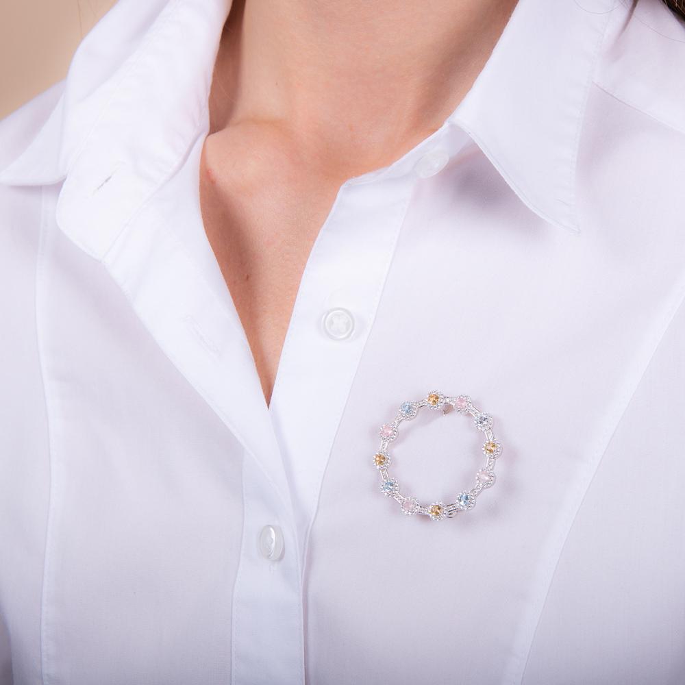 model wearing 925 sterling silver multi gemstone brooch