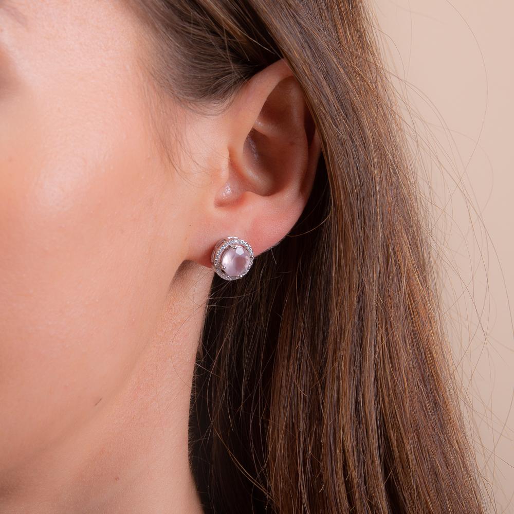 model wearing 925 sterling silver rose quartz stud earrings